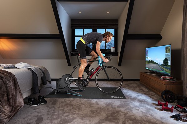 A Tacx smart turbo trainer being used with interactive training software
